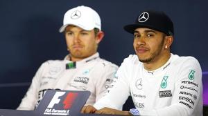 At odds: it looks like the start of a new row between the Mercedes' drivers. Photo by Getty Images.